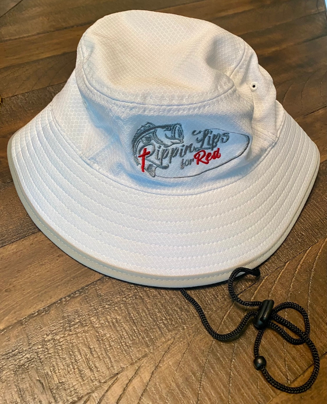 Bucket Hat by New Era – Rippin Lips For Red